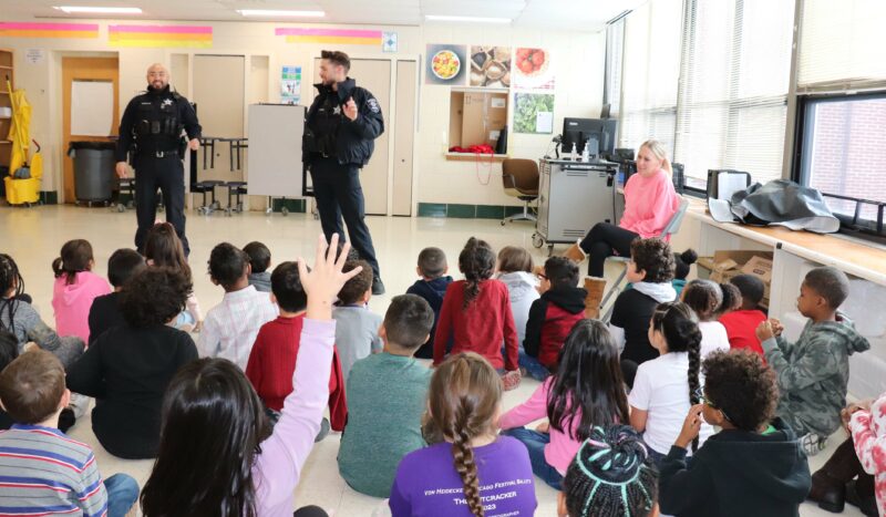 Students participate in the APD's presentation. 