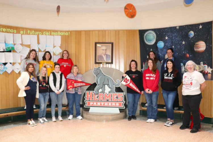 Hermes staff on College Thursday, showing off their favorite college gear!
